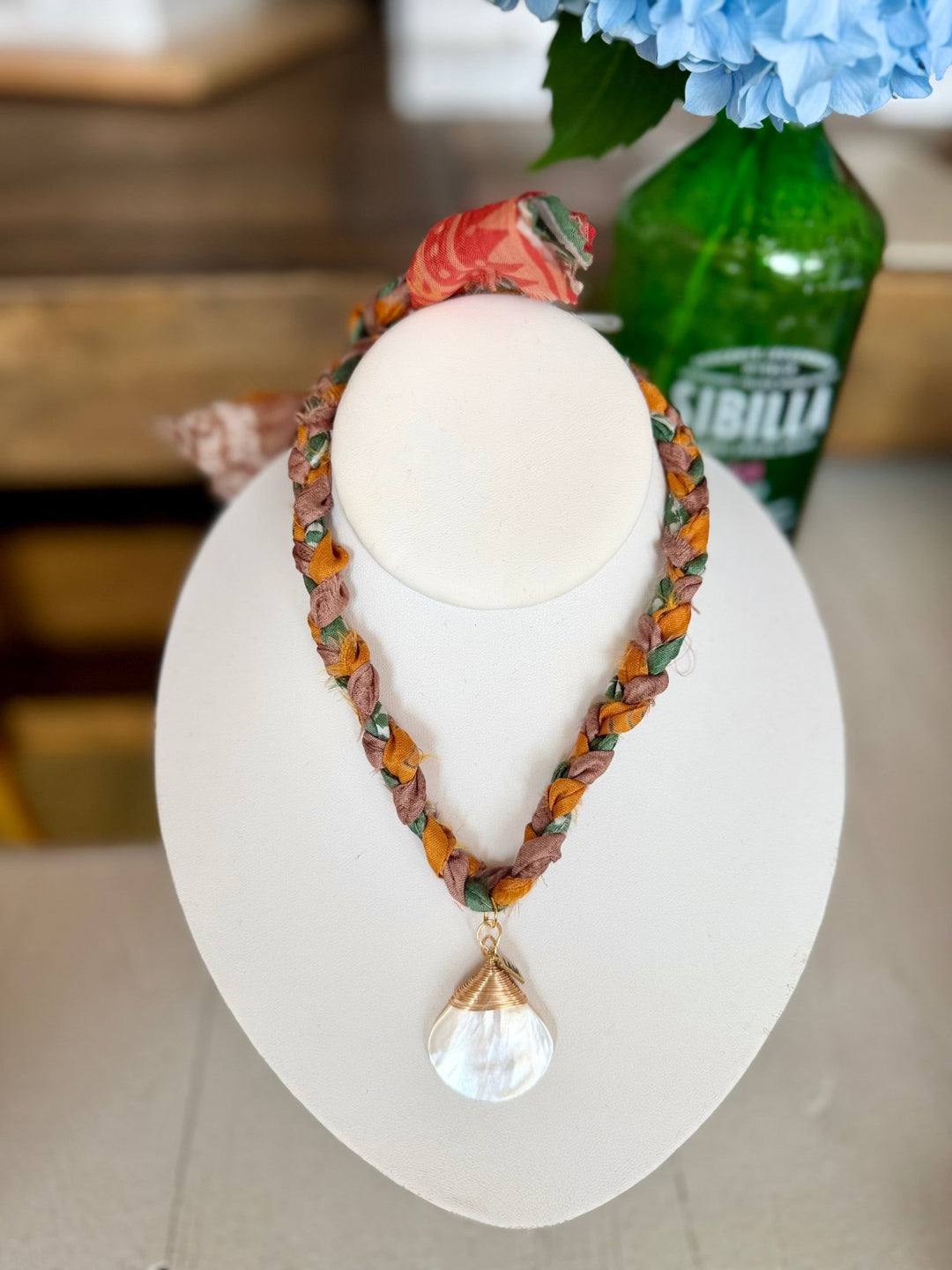 Leave A MarkBraided Green & Gold Silk Necklace with Shell Charm - Polish Boutique