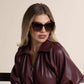 Brown and gold cat eye sunglass by Diff Eyewear.