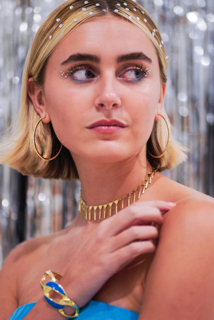 Front view of cubic zirconia hoops in gold and crystal. By Sheila Fajl.
